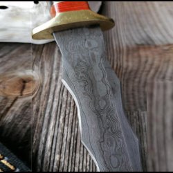 Damascus dagger with wave blade